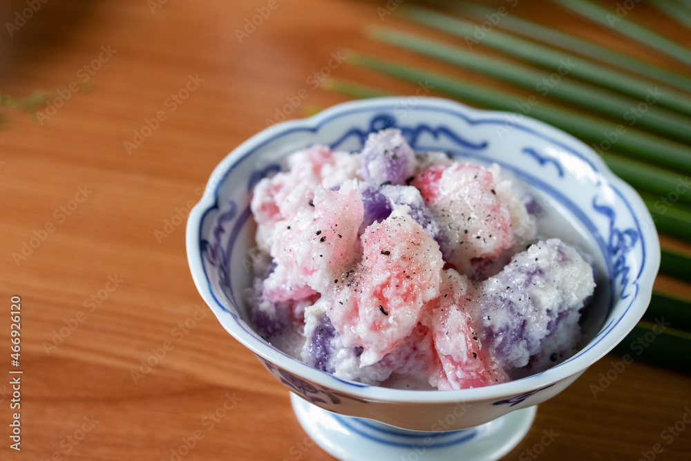 small season cake made of flour boiled in coconut milk sprinkled with shredded coconut small season cake made of flour boiled in coconut milk sprinkled with shredded coconut
