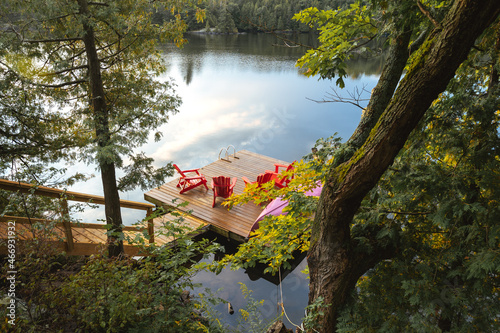 An inviting view of a dock on a calm lake