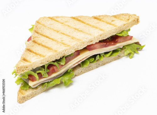 Toast bread with cheese, ham, tomatoes and salad