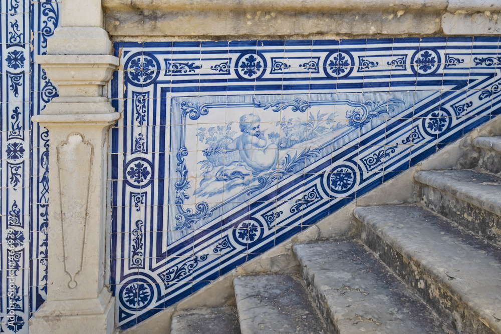 Azulejos panels in the gardens of a palace in Estoi, Algarve, Portugal