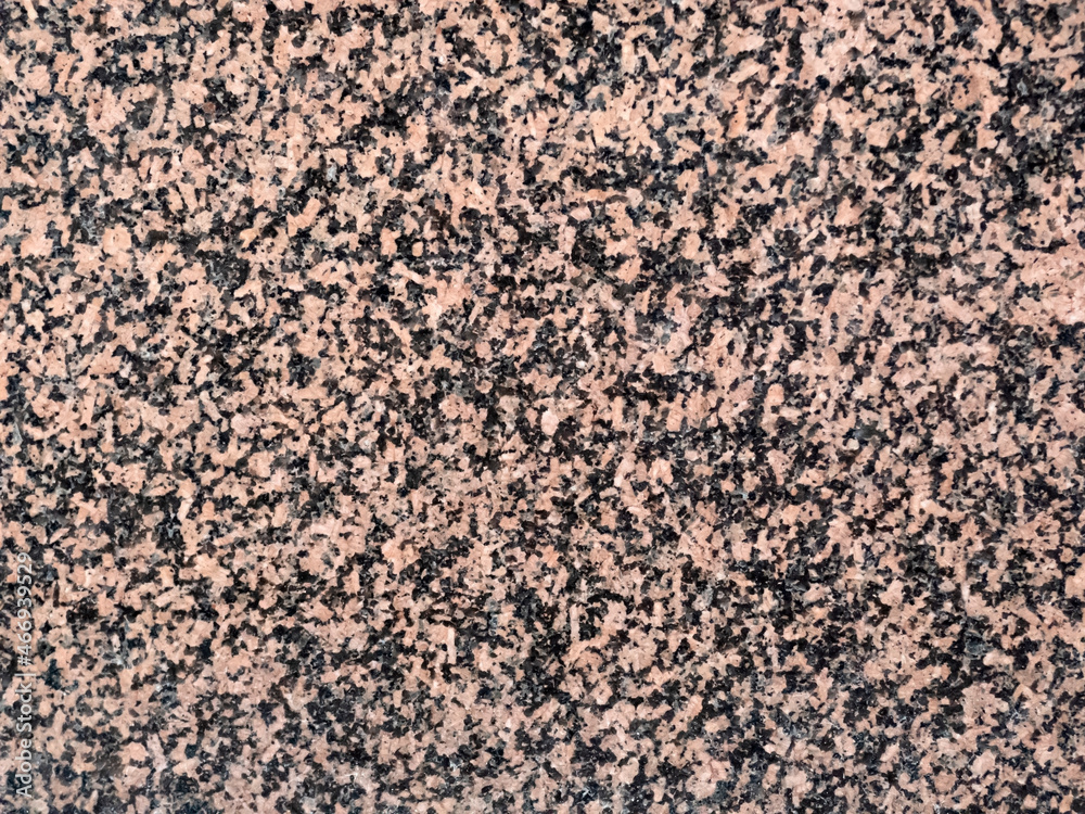 Brown granite texture closeup. Can be used as wall or floor for your design works. Brown granite texture closeup. Can be used as wall or floor for your design works.
