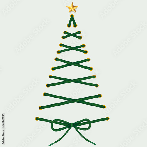 Christmas tree made of green lacing with star. 