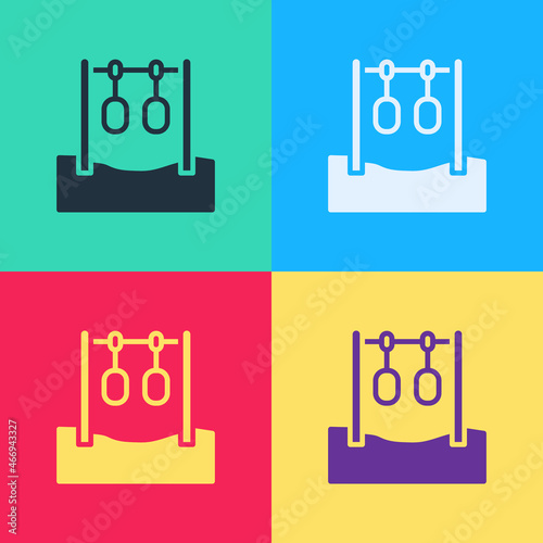 Pop art Gymnastic rings icon isolated on color background. Playground equipment with hanging rope with rings. Vector
