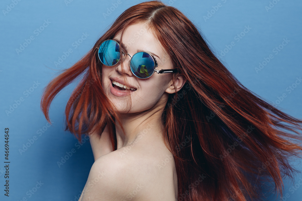 attractive woman with bare shoulders fashionable glasses blue background attractive woman with bare shoulders fashionable glasses blue background
