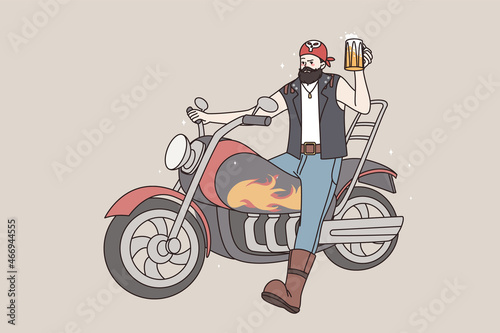 Cool bearded man biker sit on motorcycle drinking beer. Brutal male rocker on motor bike enjoy alcoholic beverage. Subculture, manhood concept. Flat vector illustration, cartoon character. 