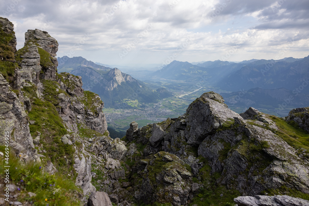 Amazing hiking day in one of the most beautiful area in Switzerland called Pizol in the canton of Saint Gallen. What a wonderful landscape in Switzerland at a sunny day. Beautiful alpine lake.