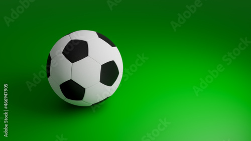 A soccer ball is lying on a green surface. 3d illustration