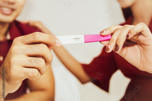 Family planning concepts   Happiness Young Couples Husband And Wife Perform Pregnancy Testing Equipment Expectations To Have Children