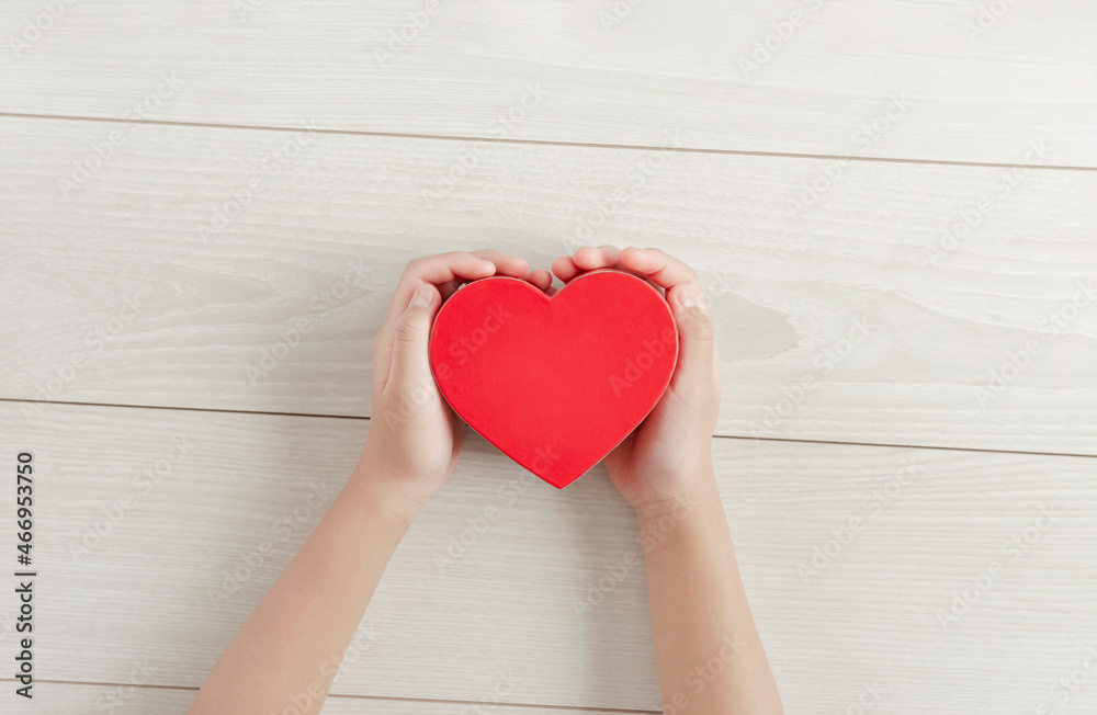 The child holding a heart in hands. Children's heart, affection, love, children's medical care, life, children's worries, heart, etc. 両手でハートを持っている子供。子供の心、愛情、愛、子供の医療、命、子供の悩み、心臓など The child holding a heart in hands. Children's heart, affection, love, children's medical care, life, children's worries, heart, etc. 両手でハートを持っている子供。子供の心、愛情、愛、子供の医療、命、子供の悩み、心臓など