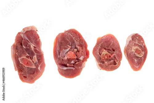 Holes bones of turkey, slices of turkey legs isolated on white, top view