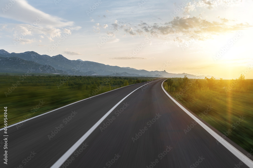 Scenic road. The road is surrounded by a magnificent natural landscape.