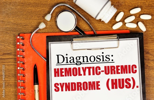 Hemolytic-uremic syndrome. The inscription of the diagnosis in the medical folder, against the background of medicines. photo