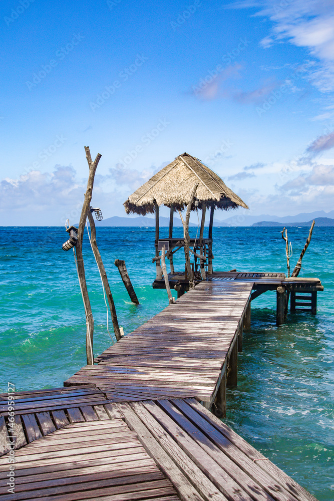 Wooden beach bar in sea and hut on pier in koh Mak island, Trat, Thailand Wooden beach bar in sea and hut on pier in koh Mak island, Trat, Thailand