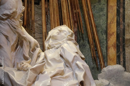 The Ecstasy of Saint Teresa of Avila Bernini Sculpture Detail at the Santa Maria della Vittoria Church in Rome, Italy photo