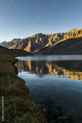 Beautiful Chandra Taal lake in Spiti valley, Himachal Pradesh. Tso Chigma or Chandra Tal is a lake in part of the Lahul and Spiti district. Chandra Tal lake also known as Lake Of The Moon photo