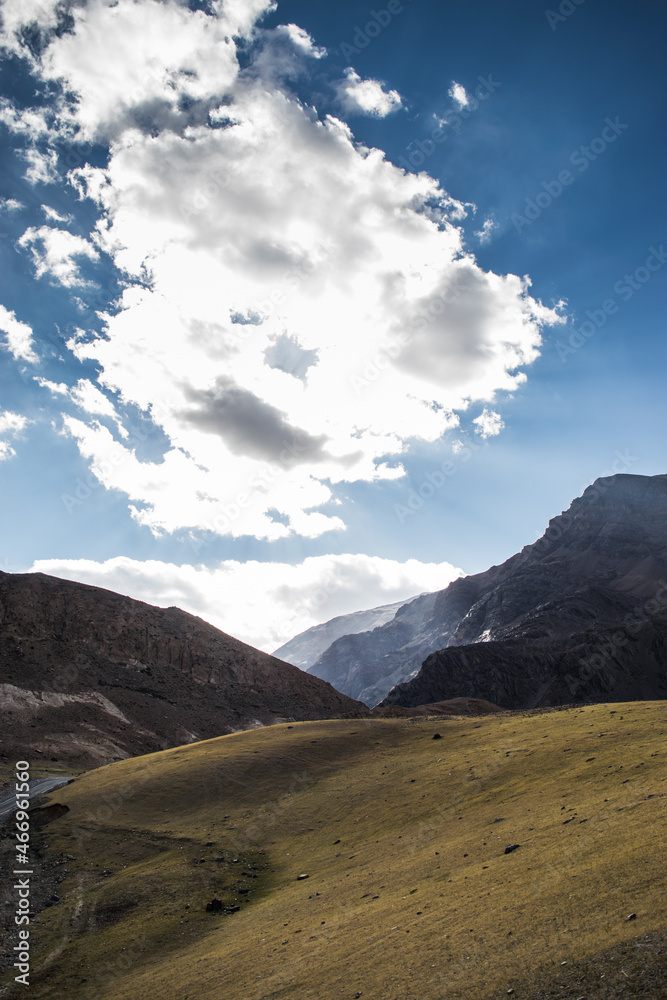 Beautiful Himalayan mountains above the green fields of the village of losar in the Spiti valley, Himachal Pradesh. Losar is a tiny village located at extreme end in cold desert valley of Spiti.