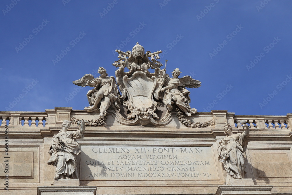 Trevi Fountain Facade Detail Against a Bright Blue Sky in Rome, Italy Trevi Fountain Facade Detail Against a Bright Blue Sky in Rome, Italy