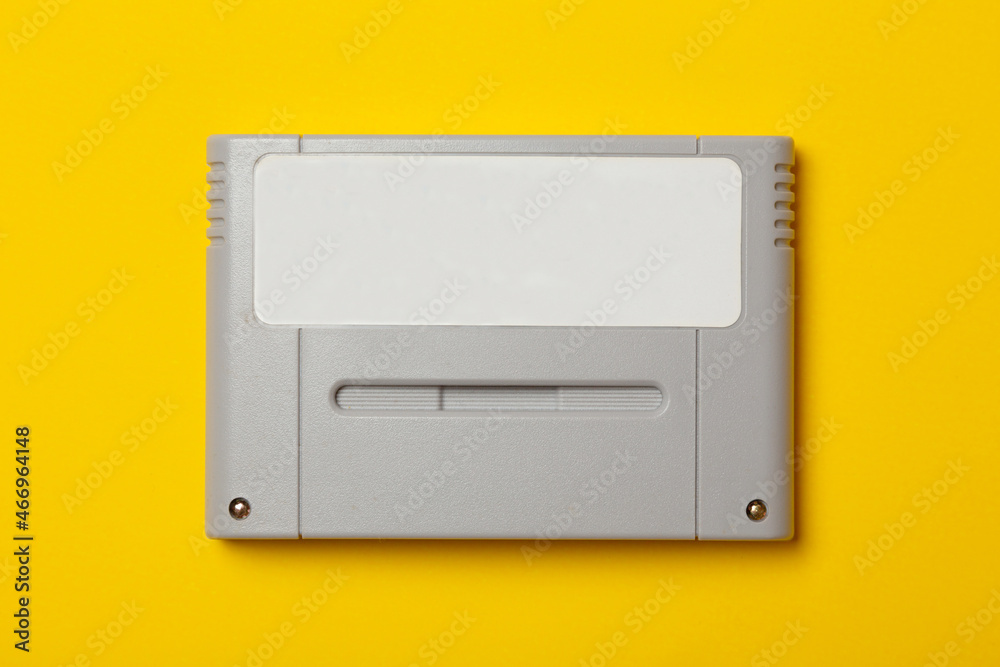 a retro game cartridge with blank label