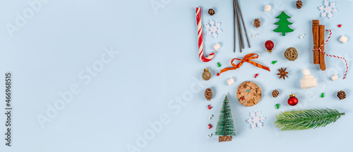 Background of Christmas and New Year holidays. A greeting card with a Christmas composition of gifts and decor with a place for text.