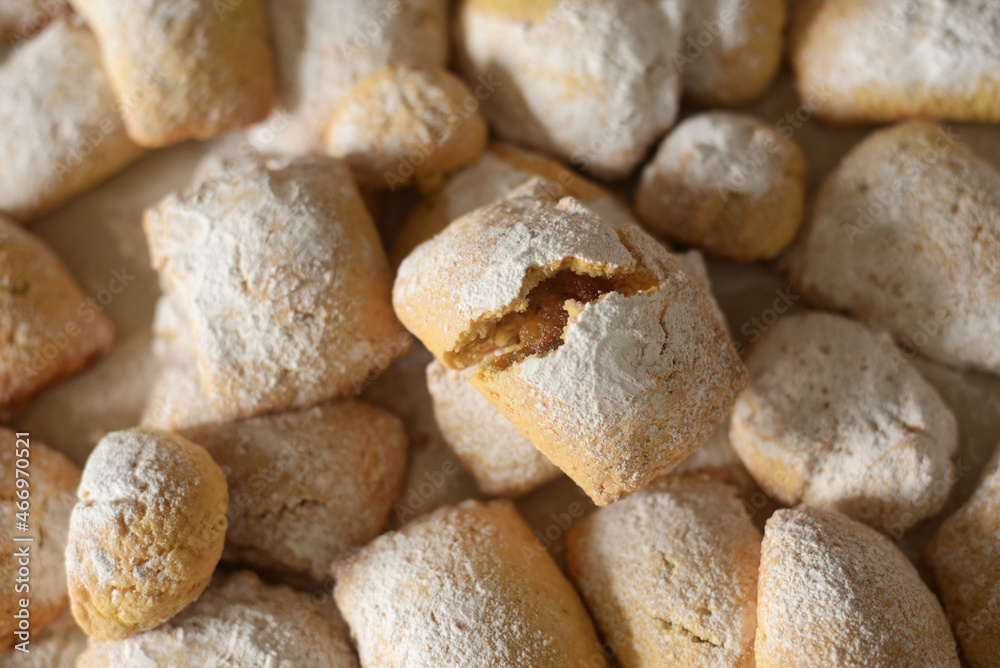 Overhead view of homemade biscuits filled with jam, typical italian pastry product. Carnival cookies. Nobody.
Overhead view of homemade biscuits filled with jam, typical italian pastry product. Carnival cookies. Nobody.