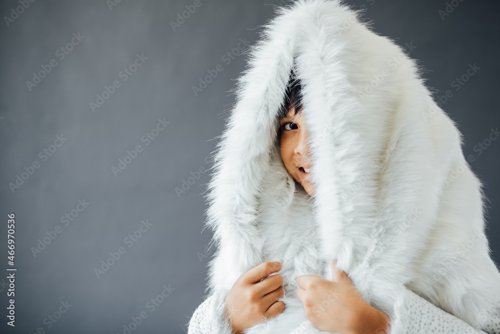Cute boy wearing winter clothes on winter season Cute boy wearing winter clothes on winter season