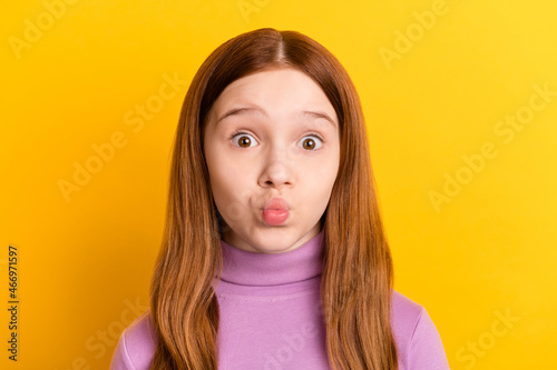 Tablou pe pânză Close-up portrait of attractive funny red-haired girl sending air kiss isolated