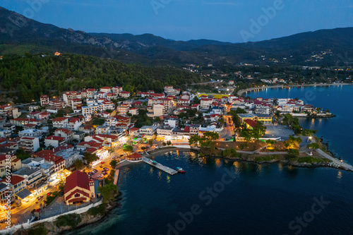 Aerial evening view of Neos Marmaras city, marina, port. Greece, Sithonia peninsula of Halkidiki 