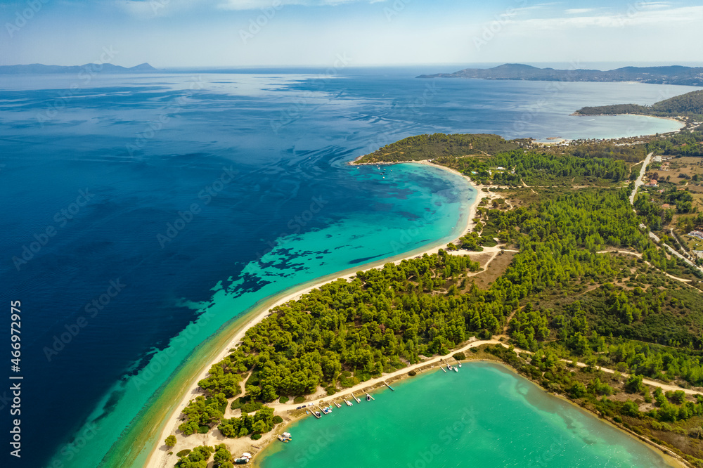 Aerial view of Lagoon beach and forest in Halkidiki, Kassandra peninsula. Aegean sea, Greece 