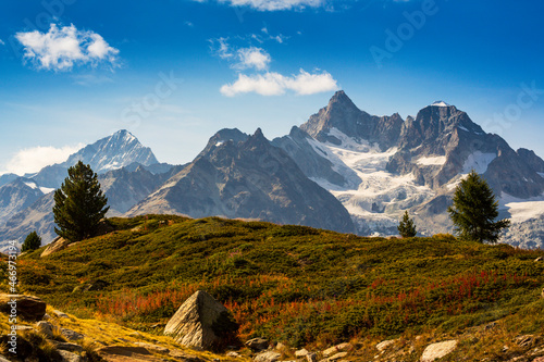 Beautiful summer scenery in the French Alps, with snow covered peaks