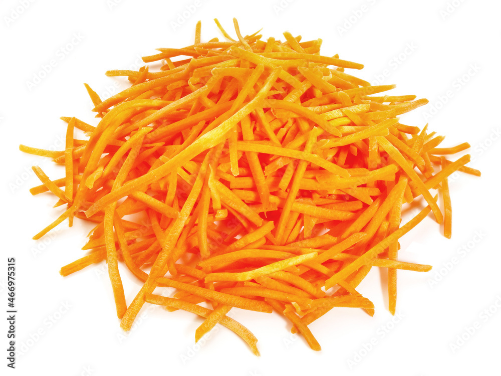 Fresh Vegetables - Fresh grated Carrots on white Background Isolated