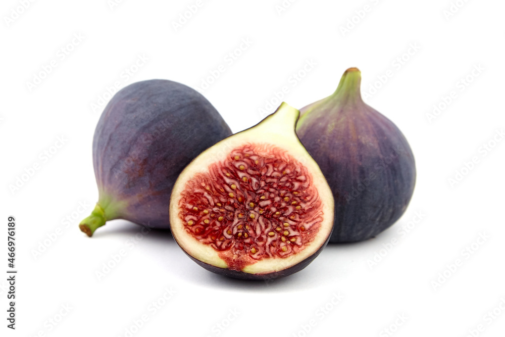 Fig fruit with ripe red half isolated on white Fig fruit with ripe red half isolated on white