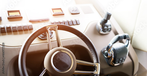 Steering wheel on luxury yacht cabin © xy