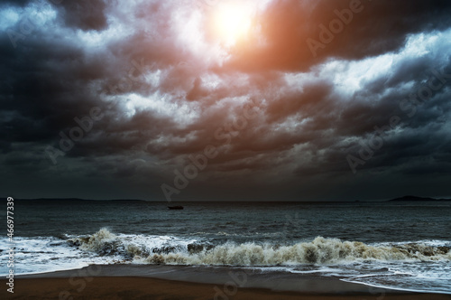 Storm seascape with dark clouds photo