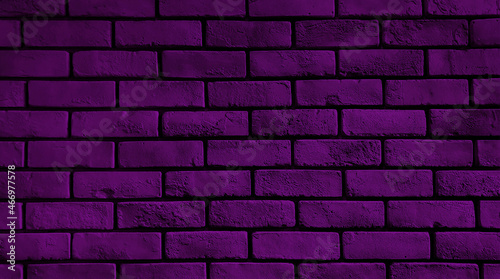 rustic dark purple brick wall texture for an abstract vintage background. close up violet brick facade for loft architectural concept.