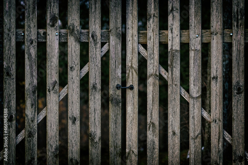 Wooden gate of rural property or cemetery
