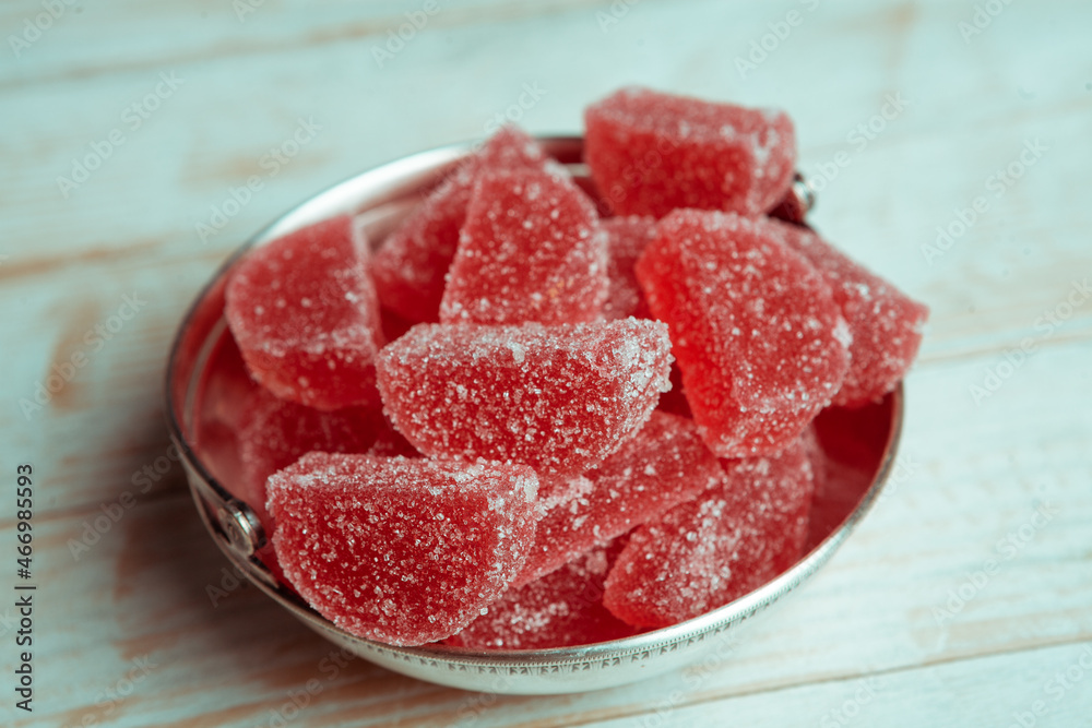 Dessert marmalade in the form of lemon and orange slices. The sweetness of jelly candy.