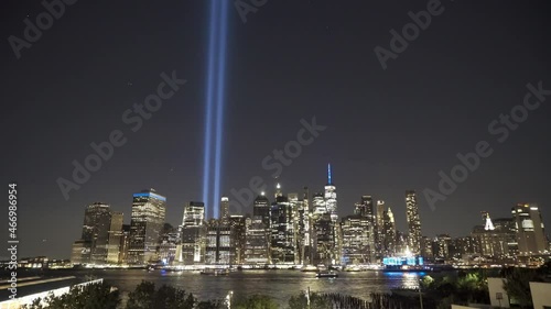 Wide Tilt Up From Downtown Manhattan To September 11th Memorial Lights photo