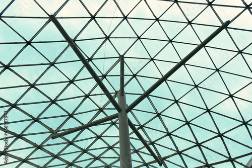 detail of a technical vaulted ceiling of steel and glass