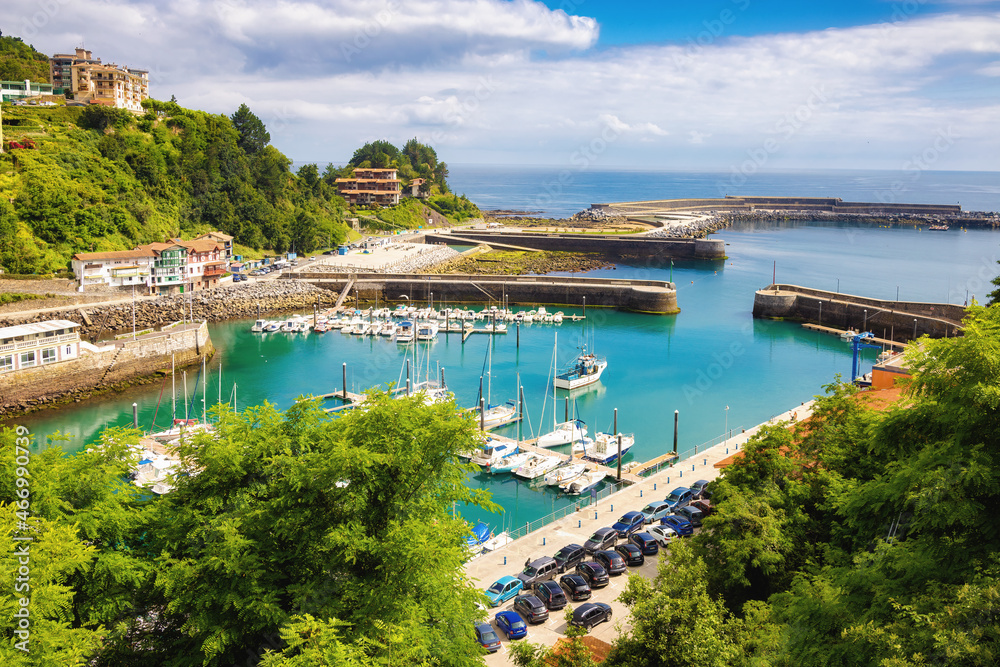 Fototapeta premium Aerial view of Mutriku fishing port on a sunny day. Gipuzkoa, Eskadi, Spain