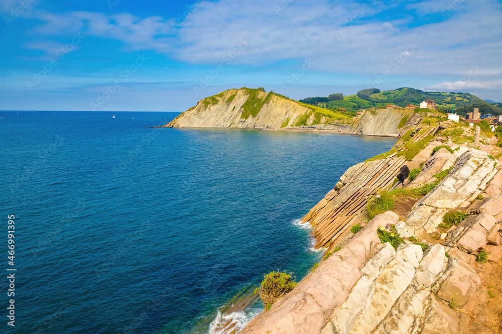 View of the bay of Zumaya with Izurrum beach and the Flysch cliff that protects it. Euskadi, Spain