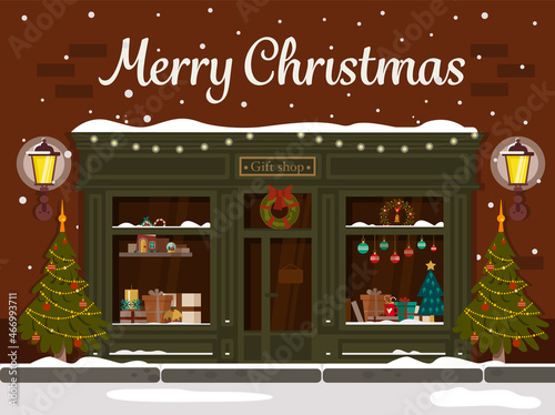 Christmas gift shop. Decorated building facade. Vector illustration in a flat style.