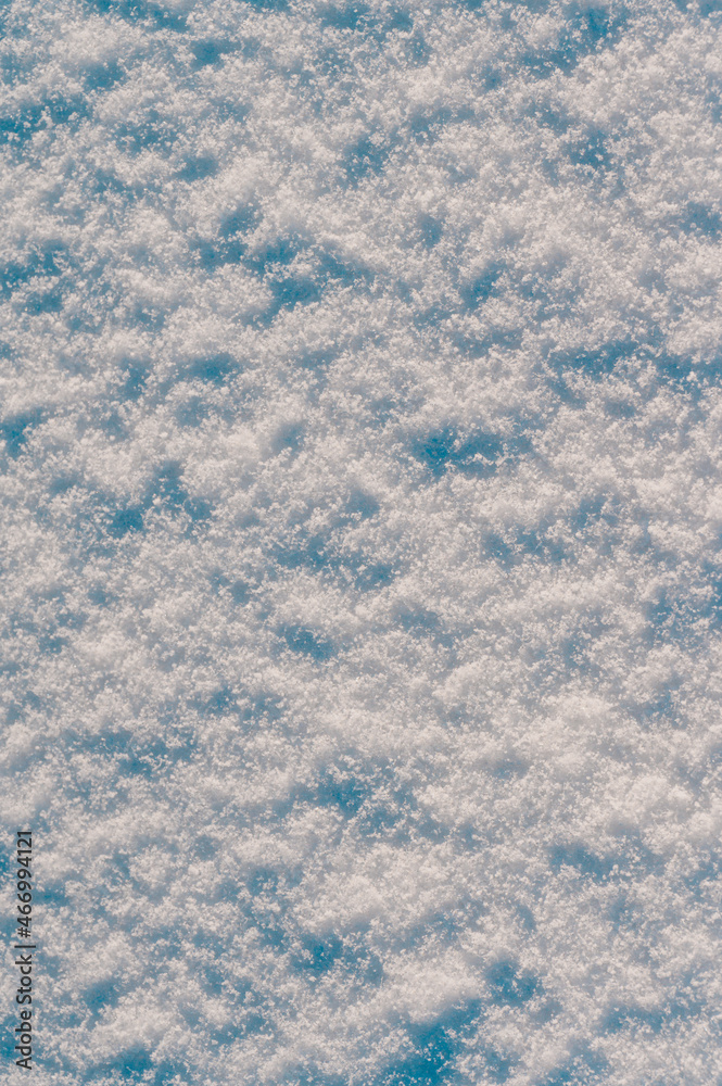 Snow and snowflakes season, texture of loose and dry snow.