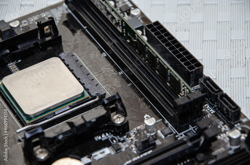 motherboard and memory in the laptop. computer repair and maintenance image.