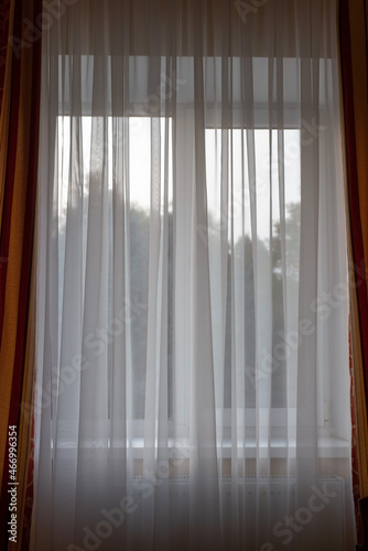 white curtains with a view and windows