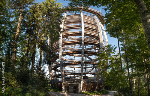 Walk and observation tower Baumwipfelpfad Salzkammergut on the top of mountain Grünberg near town Gmunden, Upper Austria. Vacation and weekend activity in Austria. New tourist attraction.