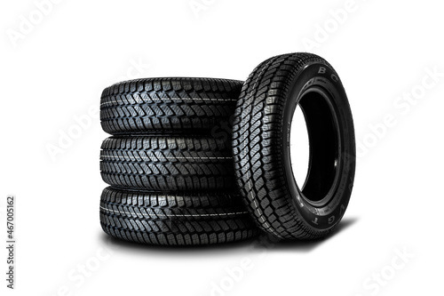 Set of four new tires on a white background. All weather tires.