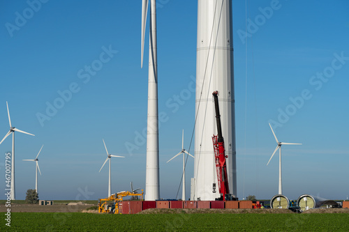 New wind turbines being constructed in the Netherlands during the energy transition. photo