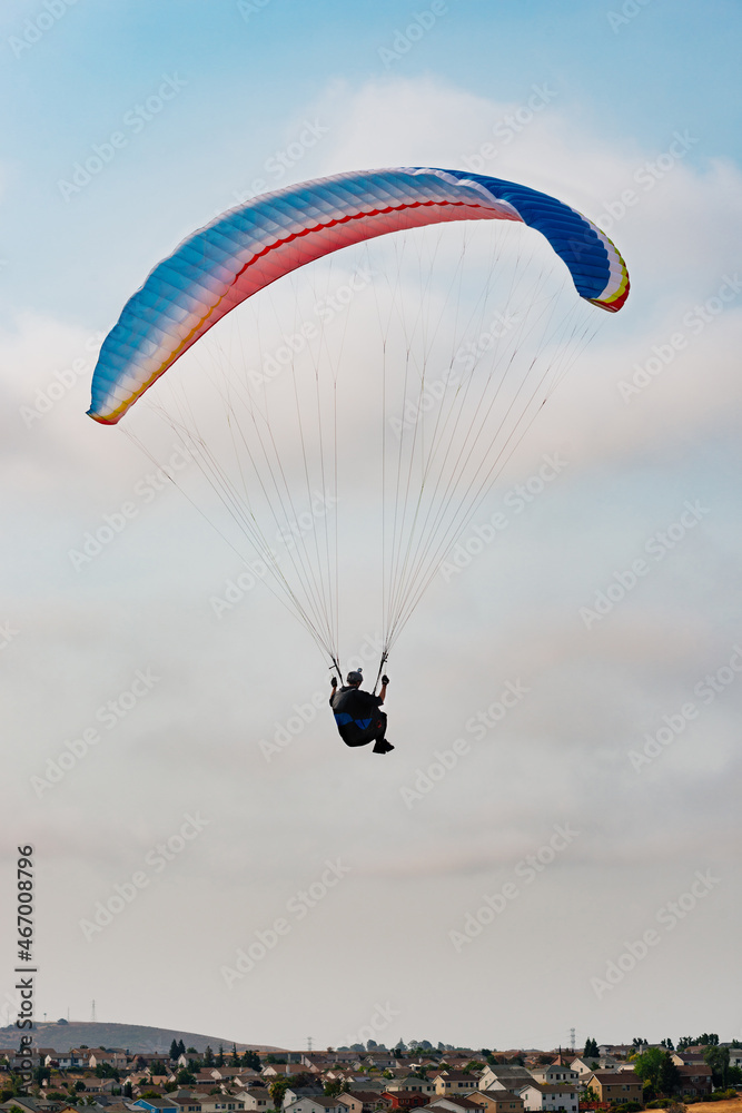 Paraglider Pilot Flying in the Sky Paraglider Pilot Flying in the Sky