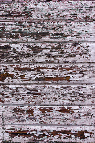 Old wooden wall plank texture in white old paint. Wooden texture of an old church.