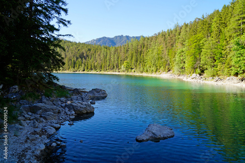Fototapeta Naklejka Na Ścianę i Meble -  picturesque turquois alpine lake Eibsee (yew lake) by the foot of mountain Zugspitze in Bavaria (the German Alps, Garmisch-Partenkirchen, Grainau, Bavaria, Germany)	